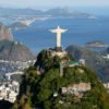 Vista do Cristo Redentor e Pão de Açúcar com o texto "Transfer privado Búzios para Rio" e logotipo da Costa do Sol Tour.